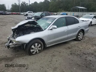 2003 Mitsubishi Galant ES z VIN 4A3AA46G33E144482, wystawiony jako Copart lot #79605944 z przebiegiem Nie podano mil oraz Szkoda całkowita • Salvage title. Historia ofert i sprzedaży dostępna na DreamBid. Obrazek 1.