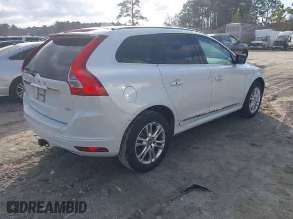 2015 Volvo XC60 T5 Drive-E Premier z VIN YV440MDB5F2610281, wystawiony jako IAAI lot #41479979 z przebiegiem 124 841 mil mil oraz . Historia ofert i sprzedaży dostępna na DreamBid. Obrazek 4.