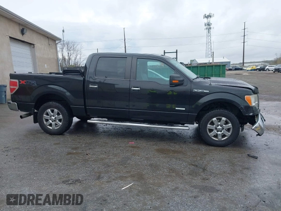 2013 Ford F-150 XL with VIN 1FTFW1ETXDFD72322, listed as a IAAI auction lot 41957807 with 312,909 mi miles. Bid and sale history available at carsss.com. Image 13.