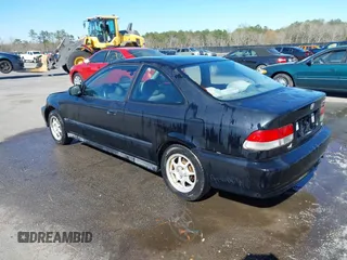 1999 Honda Civic HX with VIN 1HGEJ7123XL068508, listed as a IAAI auction lot 41803733 with 191,412 mi miles. Bid and sale history available at carsss.com. Image 3.