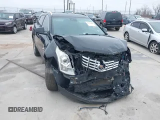 2015 Cadillac SRX Premium Collection z VIN 3GYFNDE3XFS576695, wystawiony jako IAAI lot #41612836 z przebiegiem Nie podano mil oraz . Historia ofert i sprzedaży dostępna na DreamBid. Obrazek 12.