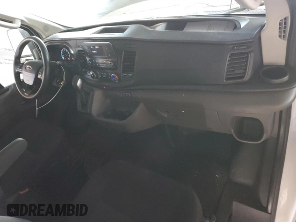 2021 Ford Transit Cargo with VIN 1FTBR1Y85MKA24853, listed as a Copart auction lot 86571514 with 19,933 mi miles and Salvage title. Bid and sale history available at DreamBid. Image 8.