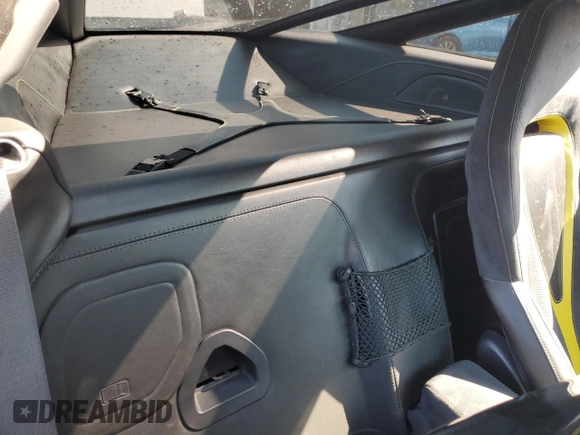 2018 McLaren 720S z VIN SBM14DCA9JW001142, wystawiony jako Copart lot #76969554 z przebiegiem Nie podano mil oraz Szkody całkowita. Historia ofert i sprzedaży dostępna na DreamBid. Obrazek 10.