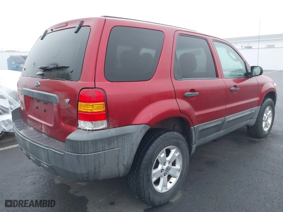 2007 Ford Escape XLT with VIN 1FMCU03147KC00069, listed as a IAAI auction lot 41343434 with 209,220 mi miles. Bid and sale history available at carsss.com. Image 4.