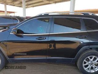 2015 Jeep Cherokee Latitude with VIN 1C4PJLCB8FW669150, listed as a IAAI auction lot 42122669 with 194,525 mi miles and . Bid and sale history available at DreamBid. Image 14.