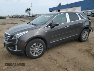 2019 Cadillac XT5 Luxury FWD z VIN 1GYKNCRSXKZ132871, wystawiony jako Copart lot #54879405 z przebiegiem 57 325 mil mil oraz Szkoda całkowita • Salvage title. Historia ofert i sprzedaży dostępna na DreamBid. Obrazek 1.