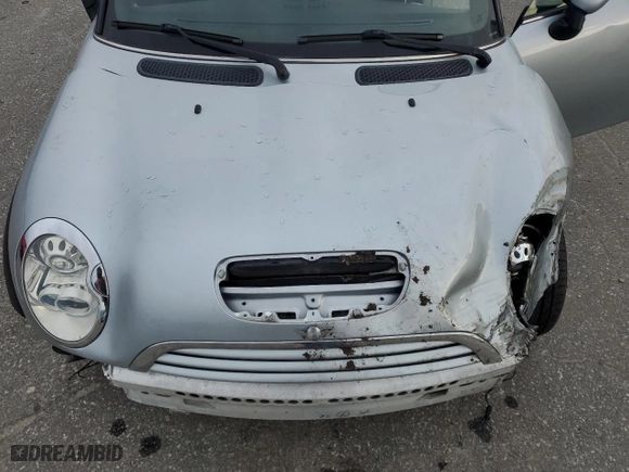 2005 MINI Cooper Convertible S with VIN WMWRH33575TK56034, listed as a Copart auction lot 88043565 with 33,410 mi miles and Salvage Title. Bid and sale history available at carsss.com. Image 11.