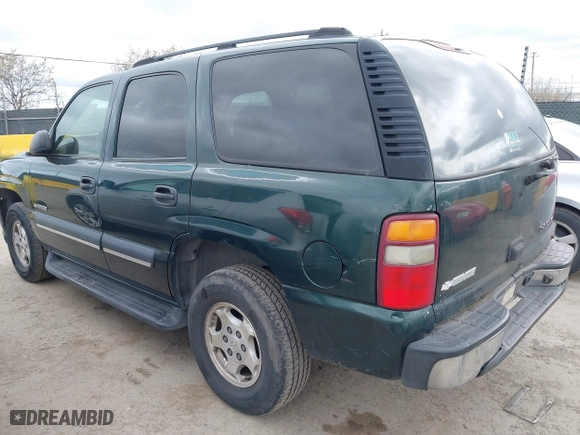 2003 Chevrolet Tahoe LS with VIN 1GNEC13V13J250718, listed as a IAAI auction lot 41981819 with 303,969 mi miles. Bid and sale history available at carsss.com. Image 3.