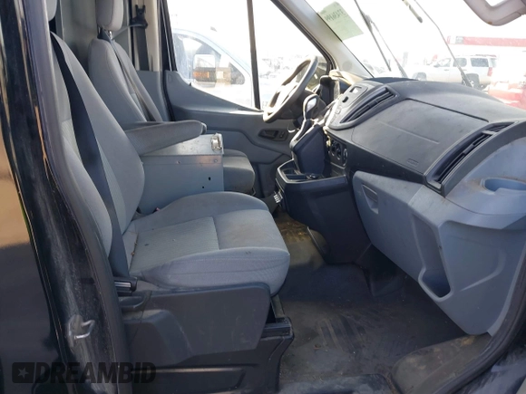 2016 Ford Transit Cargo z VIN 1FTYR2CM0GKB51759, wystawiony jako IAAI lot #41602091 z przebiegiem 158 997 mil mil oraz . Historia ofert i sprzedaży dostępna na DreamBid. Obrazek 5.