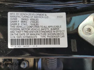 2022 Honda Civic EX-L z VIN 19XFL1H75NE002379, wystawiony jako Copart lot #54178595 z przebiegiem 15 233 mil mil oraz Szkoda całkowita • Salvage title. Historia ofert i sprzedaży dostępna na DreamBid. Obrazek 13.