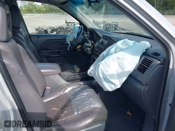 2003 Honda Pilot EX with VIN 2HKYF18603H504829, listed as a IAAI auction lot 42083247 with 247,429 mi miles and . Bid and sale history available at carsss.com. Image 5.
