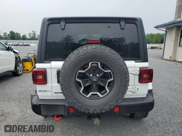 2023 Jeep Wrangler Rubicon with VIN 1C4JJXFM3PW585720, listed as a Copart auction lot 59776305 with 19,190 mi miles and Salvage title. Bid and sale history available at DreamBid. Image 6.