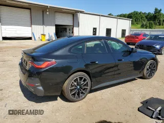 2022 BMW i4 eDrive40 with VIN WBY73AW05NFM59840, listed as a Copart auction lot 55608094 with 25,720 mi miles and Salvage Title. Bid and sale history available at carsss.com. Image 3.
