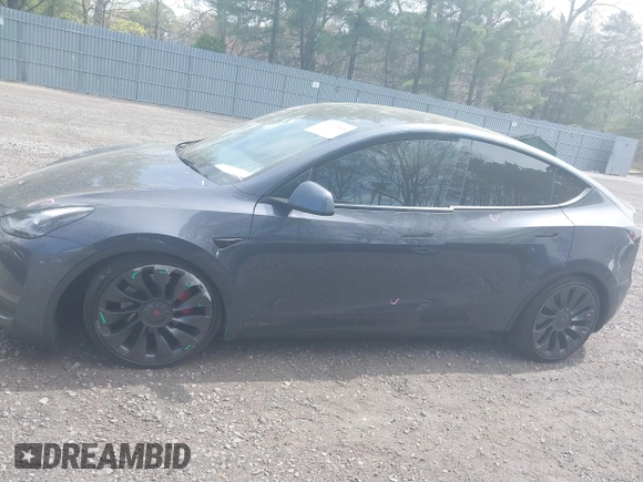 2022 Tesla Model Y Performance with VIN 7SAYGDEF3NF324705, listed as a IAAI auction lot 42076565 with 66,573 mi miles and . Bid and sale history available at DreamBid. Image 14.