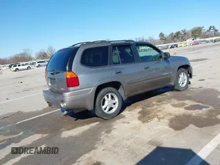 2005 GMC Envoy SLE z VIN 1GKDT13S252331044, wystawiony jako IAAI lot #41749219 z przebiegiem 263 876 mil mil oraz . Historia ofert i sprzedaży dostępna na DreamBid. Obrazek 4.