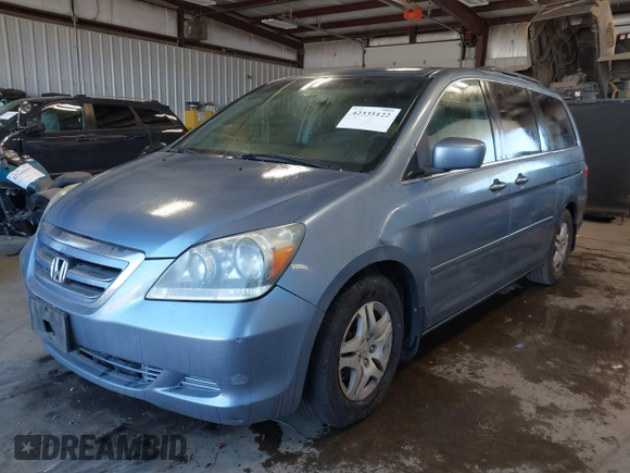 2007 Honda Odyssey EX-L z VIN 5FNRL38617B078923, wystawiony jako IAAI lot #42335122 z przebiegiem 154 352 mil mil oraz . Historia ofert i sprzedaży dostępna na DreamBid. Obrazek 17.