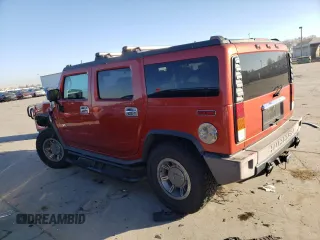 2004 Hummer H2 with VIN 5GRGN23U24H101928, listed as a Copart auction lot 86820104 with 197,079 mi miles and Salvage Title. Bid and sale history available at carsss.com. Image 2.
