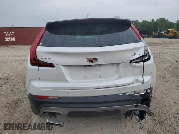 2023 Cadillac XT4 FWD Premium Luxury with VIN 1GYFZCR42PF193101, listed as a Copart auction lot 54977605 with 14,258 mi miles and Non repairable. Bid and sale history available at DreamBid. Image 6.