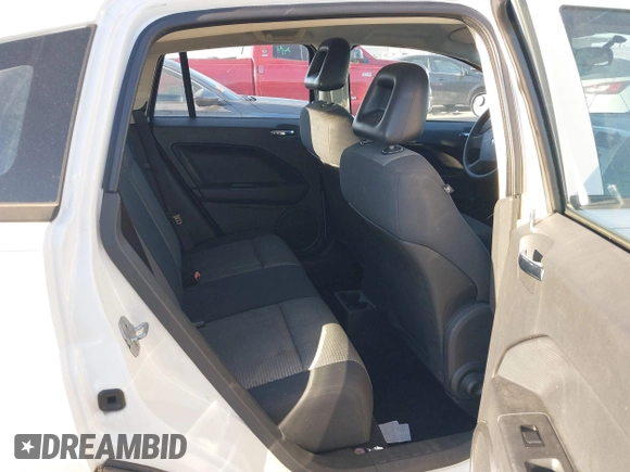 2008 Dodge Caliber SXT with VIN 1B3HB48B38D668777, listed as a IAAI auction lot 41202480 with 156,790 mi miles and . Bid and sale history available at DreamBid. Image 8.