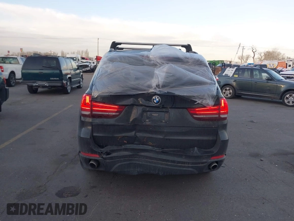 2015 BMW X5 xDrive35i with VIN 5UXKR0C59F0K59728, listed as a IAAI auction lot 41701083 with 83,267 mi miles. Bid and sale history available at carsss.com. Image 16.