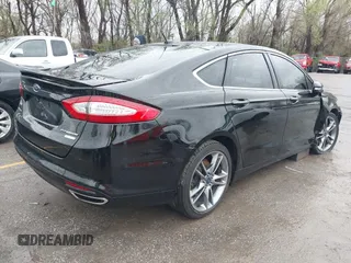 2016 Ford Fusion Titanium with VIN 3FA6P0K90GR273795, listed as a IAAI auction lot 41931175 with 108,531 mi miles and . Bid and sale history available at carsss.com. Image 4.