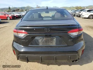 2024 Toyota Corolla SE with VIN 5YFS4MCE7RP210092, listed as a Copart auction lot 49355055 with 8,595 mi miles and Salvage Title. Bid and sale history available at carsss.com. Image 6.