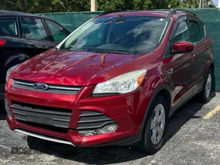 2014 Ford Escape SE with VIN 1FMCU9GXXEUB75330, listed as a Copart auction lot 62310025 with 119,858 mi miles and Clean title. Bid and sale history available at DreamBid. Image 2.
