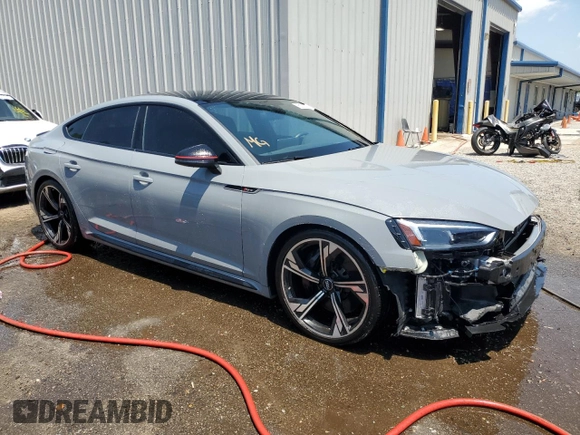 2019 Audi RS 5 Sportback z VIN WUABWCF5XKA907964, wystawiony jako Copart lot #60002343 z przebiegiem 27 182 mil mil oraz . Historia ofert i sprzedaży dostępna na DreamBid. Obrazek 4.