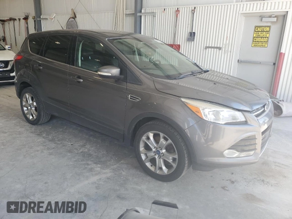 2013 Ford Escape SEL with VIN 1FMCU9H93DUA35005, listed as a Copart auction lot 63867005 with 209,362 mi miles and Clean title. Bid and sale history available at DreamBid. Image 4.