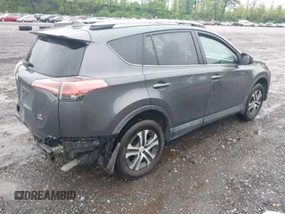 2017 Toyota RAV4 LE with VIN 2T3BFREV5HW603663, listed as a IAAI auction lot 42221653 with 102,734 mi miles and . Bid and sale history available at DreamBid. Image 4.