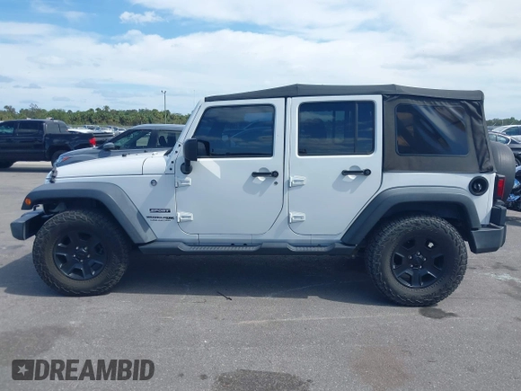 2018 Jeep Wrangler Unlimited Sport with VIN 1C4BJWDG6JL859089, listed as a IAAI auction lot 40600778 with 112,406 mi miles and . Bid and sale history available at DreamBid. Image 14.