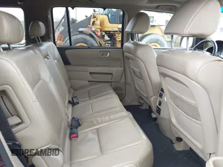 2009 Honda Pilot Touring with VIN 5FNYF48959B007813, listed as a IAAI auction lot 41823645 with 200,571 mi miles and . Bid and sale history available at carsss.com. Image 8.