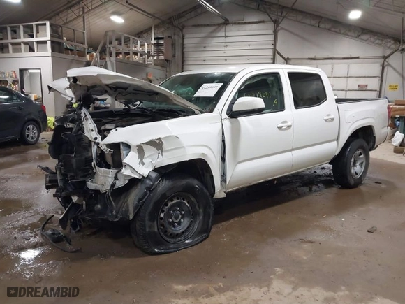 2023 Toyota Tacoma 4WD SR with VIN 3TMCZ5AN7PM571924, listed as a IAAI auction lot 41219097 with 34,292 mi miles. Bid and sale history available at carsss.com. Image 2.