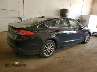 2017 Ford Fusion Hybrid SE z VIN 3FA6P0LU2HR247283, wystawiony jako Copart lot #62571495 z przebiegiem 167 042 mil mil oraz Nie do naprawy • Non repairable. Historia ofert i sprzedaży dostępna na DreamBid. Obrazek 3.