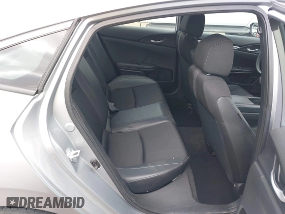 2021 Honda Civic Sport with VIN 2HGFC2F83MH510243, listed as a IAAI auction lot 41856857 with 95,739 mi miles and . Bid and sale history available at DreamBid. Image 8.