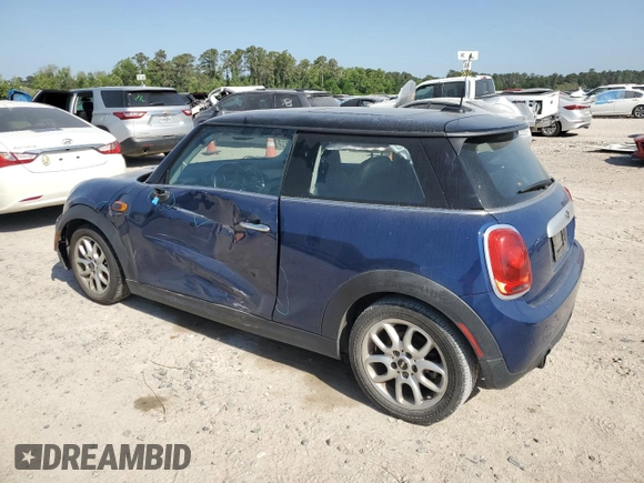 2014 MINI Hardtop with VIN WMWXM5C59ET972044, listed as a Copart auction lot 52519775 with 91,490 mi miles and Clean Title. Bid and sale history available at DreamBid. Image 2.