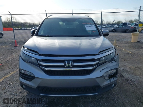 2016 Honda Pilot Touring with VIN 5FNYF6H90GB024902, listed as a IAAI auction lot 41948563 with 148,598 mi miles. Bid and sale history available at carsss.com. Image 12.
