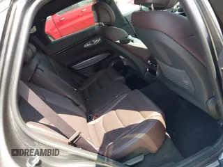2023 Genesis GV70 2.5T with VIN KMUMADTB9PU084936, listed as a IAAI auction lot 42040232 with 28,201 mi miles and . Bid and sale history available at DreamBid. Image 8.