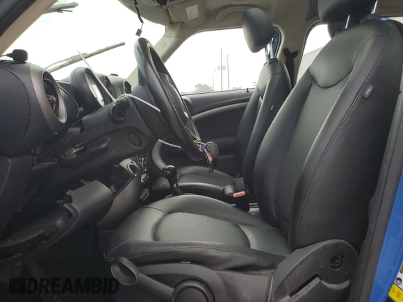 2012 MINI Countryman with VIN WMWZB3C57CWM06544, listed as a Copart auction lot 55838805 with 150,048 mi miles and Salvage Title. Bid and sale history available at DreamBid. Image 7.