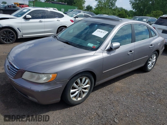 2006 Hyundai Azera SE with VIN KMHFC46F06A107049, listed as a IAAI auction lot 42638717 with 158,094 mi miles and . Bid and sale history available at DreamBid. Image 2.