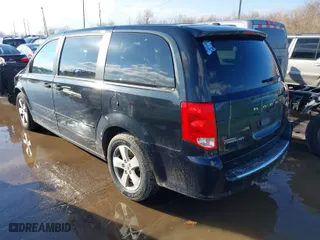 2014 Dodge Grand Caravan SXT with VIN 2C4RDGBG7ER197065, listed as a IAAI auction lot 41674441 with 233,065 mi miles. Bid and sale history available at carsss.com. Image 3.