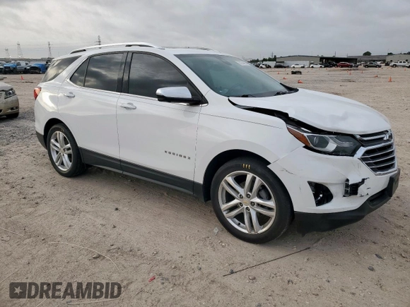 2020 Chevrolet Equinox Premier z VIN 2GNAXNEVXL6226096, wystawiony jako Copart lot #56744635 z przebiegiem 33 594 mil mil oraz Szkoda całkowita • Salvage title. Historia ofert i sprzedaży dostępna na DreamBid. Obrazek 4.