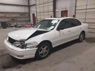 1999 Toyota Avalon XL with VIN 4T1BF18B2XU293904, listed as a IAAI auction lot 41645137 with NaN miles. Bid and sale history available at carsss.com. Image 2.