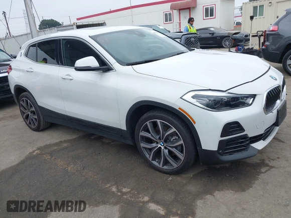 2022 BMW X2 sDrive28i z VIN WBXYH9C06N5U37719, wystawiony jako IAAI lot #42355050 z przebiegiem 33 127 mil mil oraz . Historia ofert i sprzedaży dostępna na DreamBid. Obrazek 1.