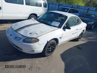 1999 Ford Escort Cool z VIN 3FAKP1137XR175834, wystawiony jako IAAI lot #42137584 z przebiegiem 222 398 mil mil oraz . Historia ofert i sprzedaży dostępna na DreamBid. Obrazek 2.