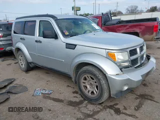 2010 Dodge Nitro SE with VIN 1D4PT2GK2AW125916, listed as a IAAI auction lot 41566224 with 396,687 mi miles. Bid and sale history available at carsss.com. Image 1.
