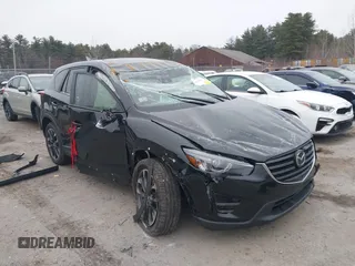 2016 Mazda CX-5 Grand Touring with VIN JM3KE4DY1G0685449, listed as a IAAI auction lot 41162840 with 134,525 mi miles. Bid and sale history available at carsss.com. Image 1.