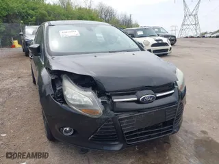 2012 Ford Focus Titanium with VIN 1FAHP3J2XCL369554, listed as a IAAI auction lot 42072931 with 95,474 mi miles. Bid and sale history available at carsss.com. Image 6.