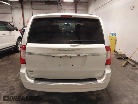 2015 Chrysler Town & Country Touring with VIN 2C4RC1BG9FR626482, listed as a IAAI auction lot 41879865 with 129,694 mi miles and . Bid and sale history available at DreamBid. Image 17.