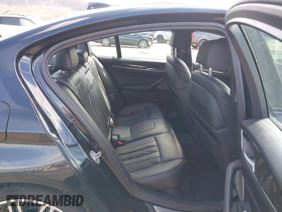 2018 BMW 5 Series M550i xDrive with VIN WBAJB9C52JB035930, listed as a IAAI auction lot 41674415 with 56,294 mi miles and . Bid and sale history available at DreamBid. Image 8.
